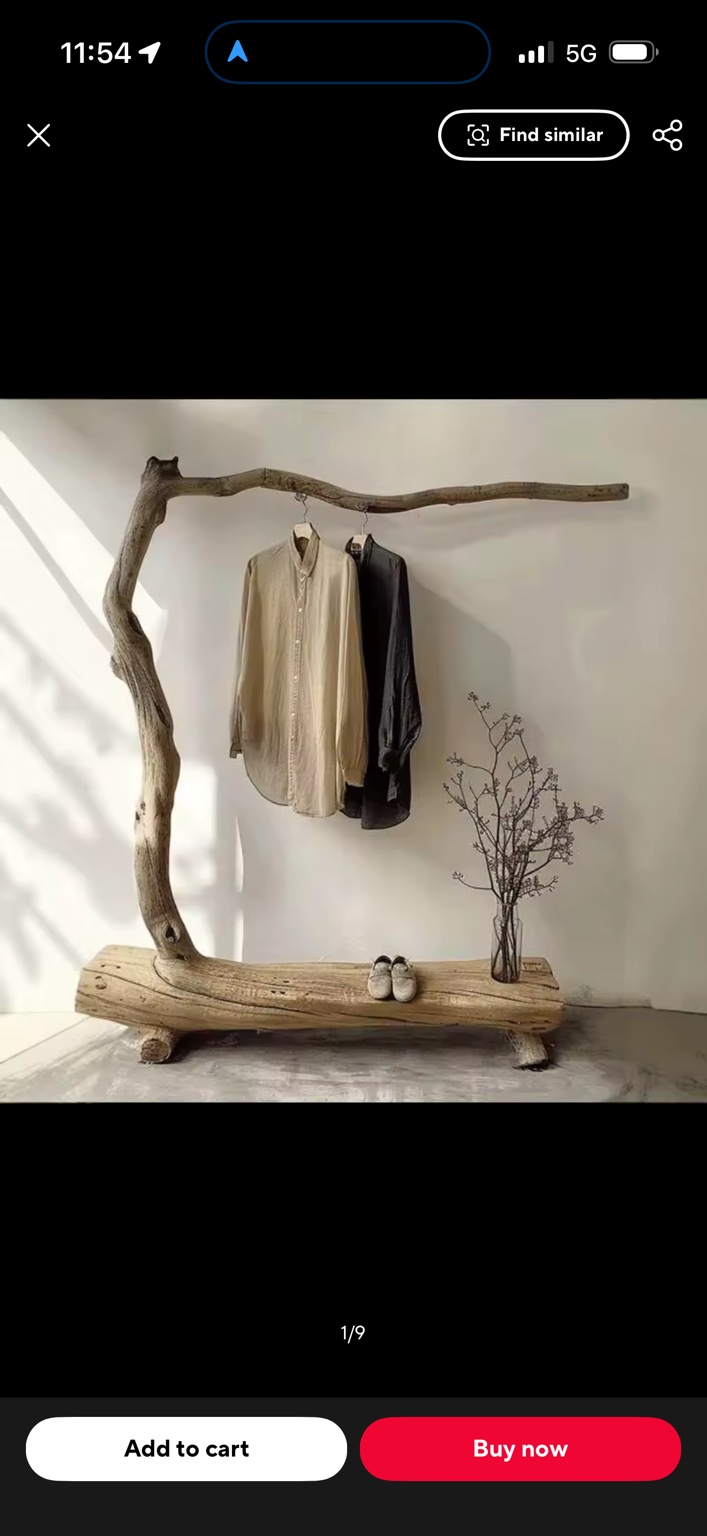 Freestanding sculptural natural wood clothes rack with an organic branch silhouette